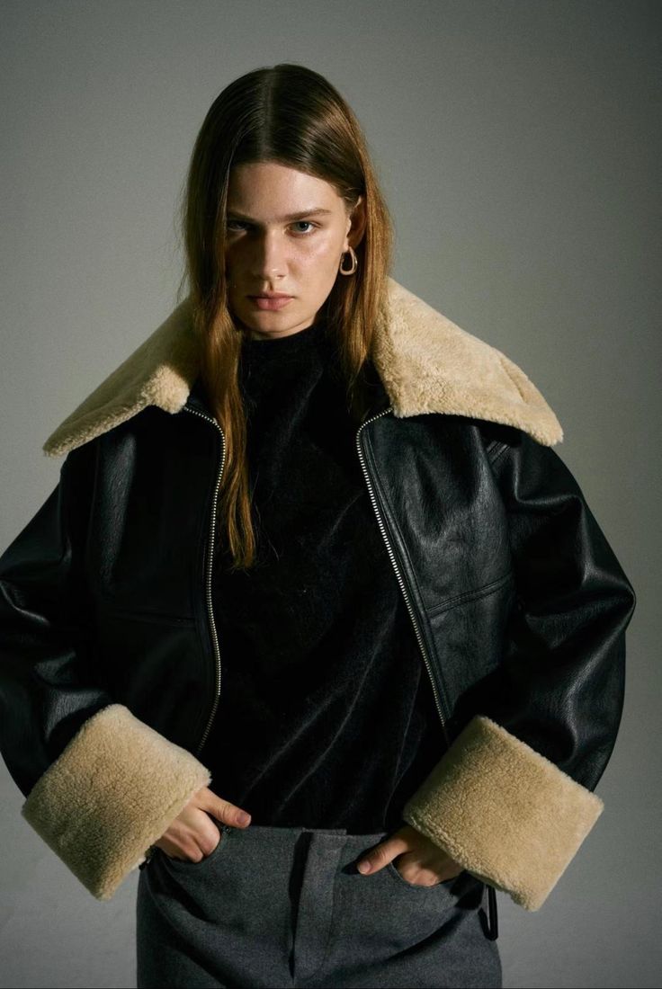 1. Man wearing shearling leather jacket 2. Woman wearing shearling leather jacket 3. Shearling leather jacket benefits 4. Men's shearling leather jacket styles 5. Women's shearling leather jacket styles