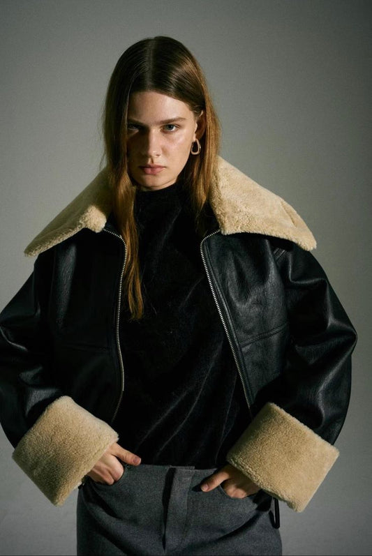1. Man wearing shearling leather jacket 2. Woman wearing shearling leather jacket 3. Shearling leather jacket benefits 4. Men's shearling leather jacket styles 5. Women's shearling leather jacket styles